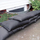 Water-absorbing and expanding flood control sandbags